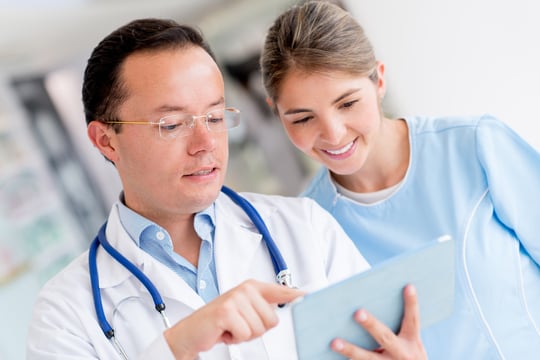 Doctor at the hospital talking to a nurse-1