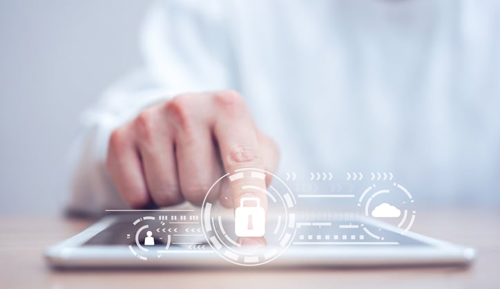close-up-programmer-man-hand-tap-on-digital-tablet-for-register-data-system-or-access-password-with-virtual-interface-protection-of-cyber-security-at-operation-room-,-futuristic-technology-concept-1184871451_4156x2400